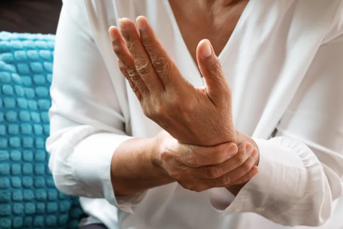 old woman suffering from wrist hand pain, health problem concept