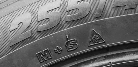 Tire side view with M plus S and 3PMSF marking or Mud and Snow and Three Peak Mountain Snow Flake symbol