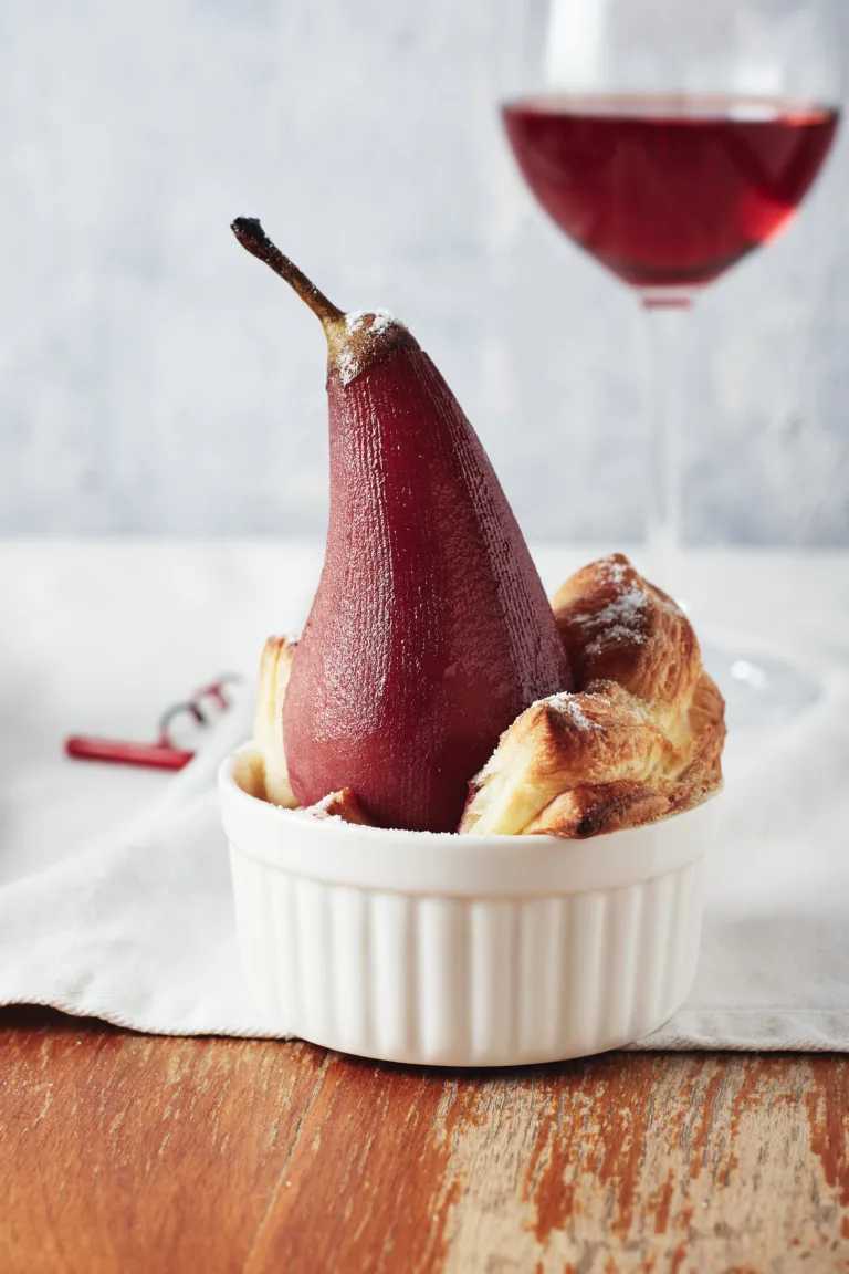 Poached pears in red wine with cinnamon.