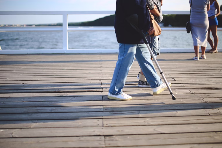 woman, crutch, old, walk, walking, jeans, injury, pier, hardworking, injury, injury, injury, injury, injury