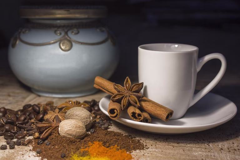 coffee pot, cup, seasoning, cinnamon, anise, nutmeg, coffee beans, wood, cinnamon, cinnamon, cinnamon, cinnamon, cinnamon, nutmeg, nutmeg, nutmeg