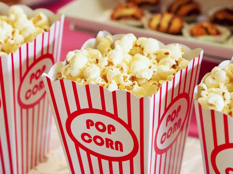 new year's eve, popcorn, food, carton, container, movies, cinema, entertainment, bucket, movie theater, theater, snack, buttered, salted, salty, tasty, delicious