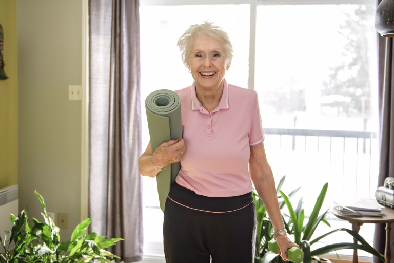 A Portrait of nice senior training at home