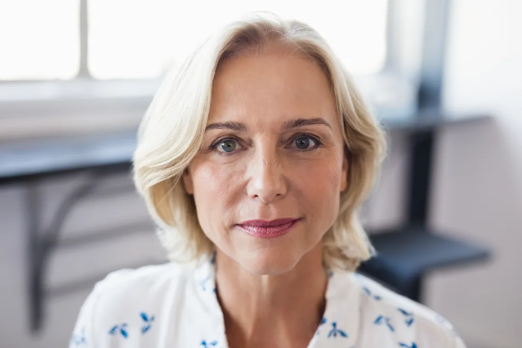 Portrait of mature business entrepreneur at office