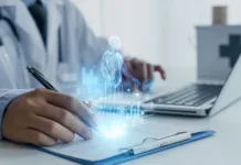 Na bolniški? Od danes veljajo nova pravila – preverite, kaj smete in česa ne A doctor uses a futuristic digital interface displaying a holographic human anatomy above a clipboard, symbolizing advanced AI in healthcare