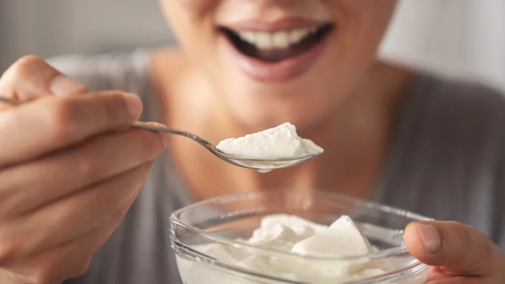 Yogurt eating concept, natural healthy probiotic