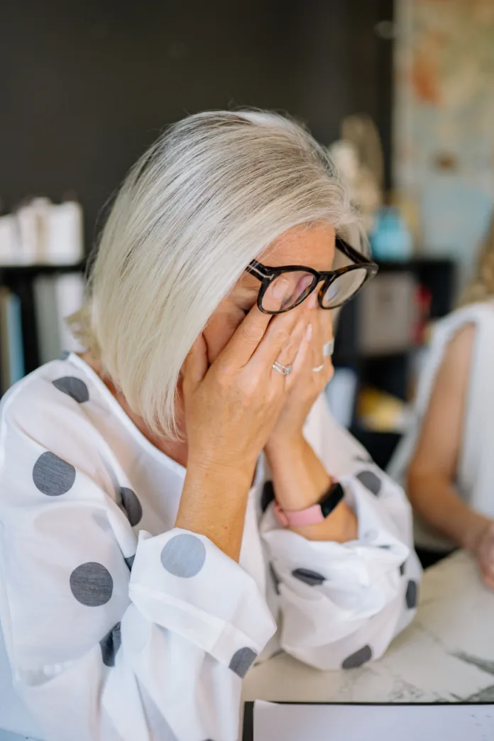 tired-woman-in-polka-dot-long-sleeve-blouse-stockpack-pexels Tired woman in polka dot long sleeve blouse