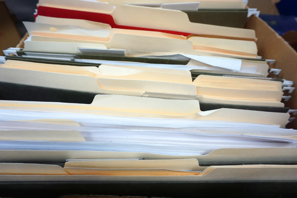 high angle view of documents and folders archive in box