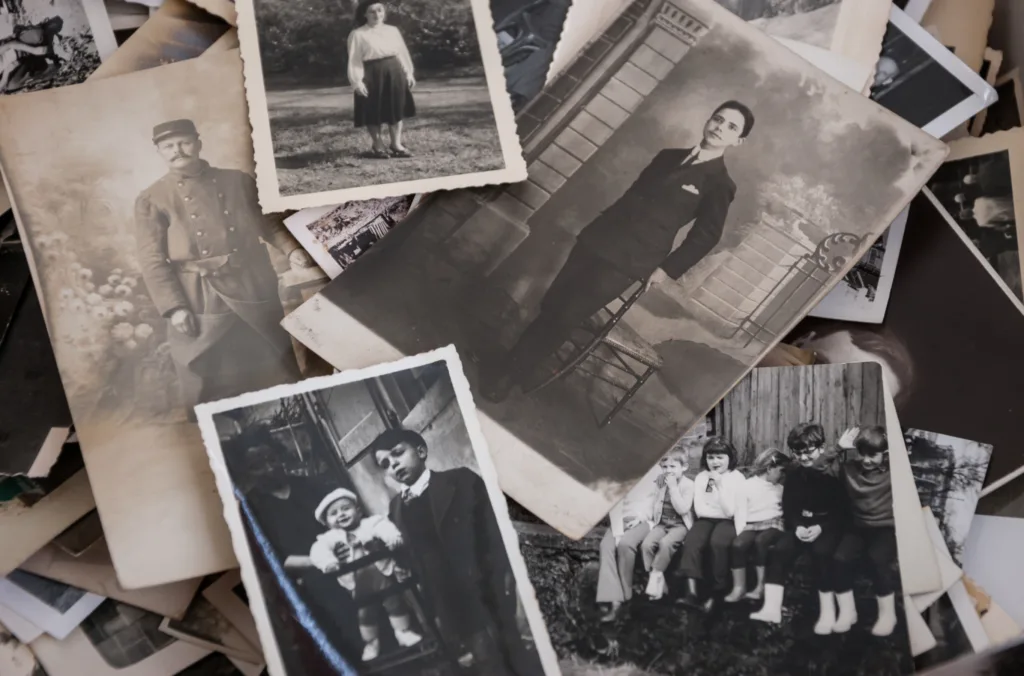 Paris, France - March 10, 2013: Old black and white and sepia photos at flea market. There are more than 20 flea markets in Paris.
